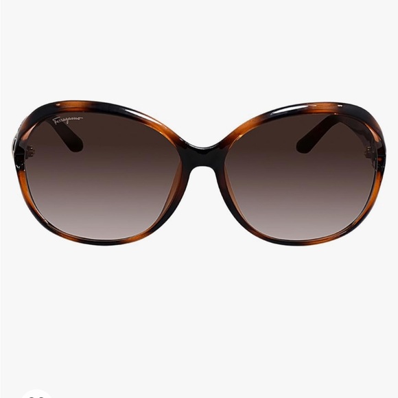 Salvatore Ferragamo Sunglasses
SF77OSA 214 Tortoise Brown
Gradient, new no box . - Picture 5 of 16